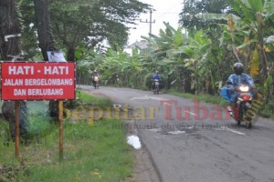 Jalan Merakurak berlobang